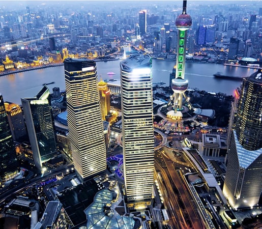 The image shows an aerial view of the Lujiazui Financial District in Pudong, Shanghai, China, featuring iconic skyscrapers like the Shanghai World Financial Center, Jin Mao Tower, and the Oriental Pearl TV Tower.